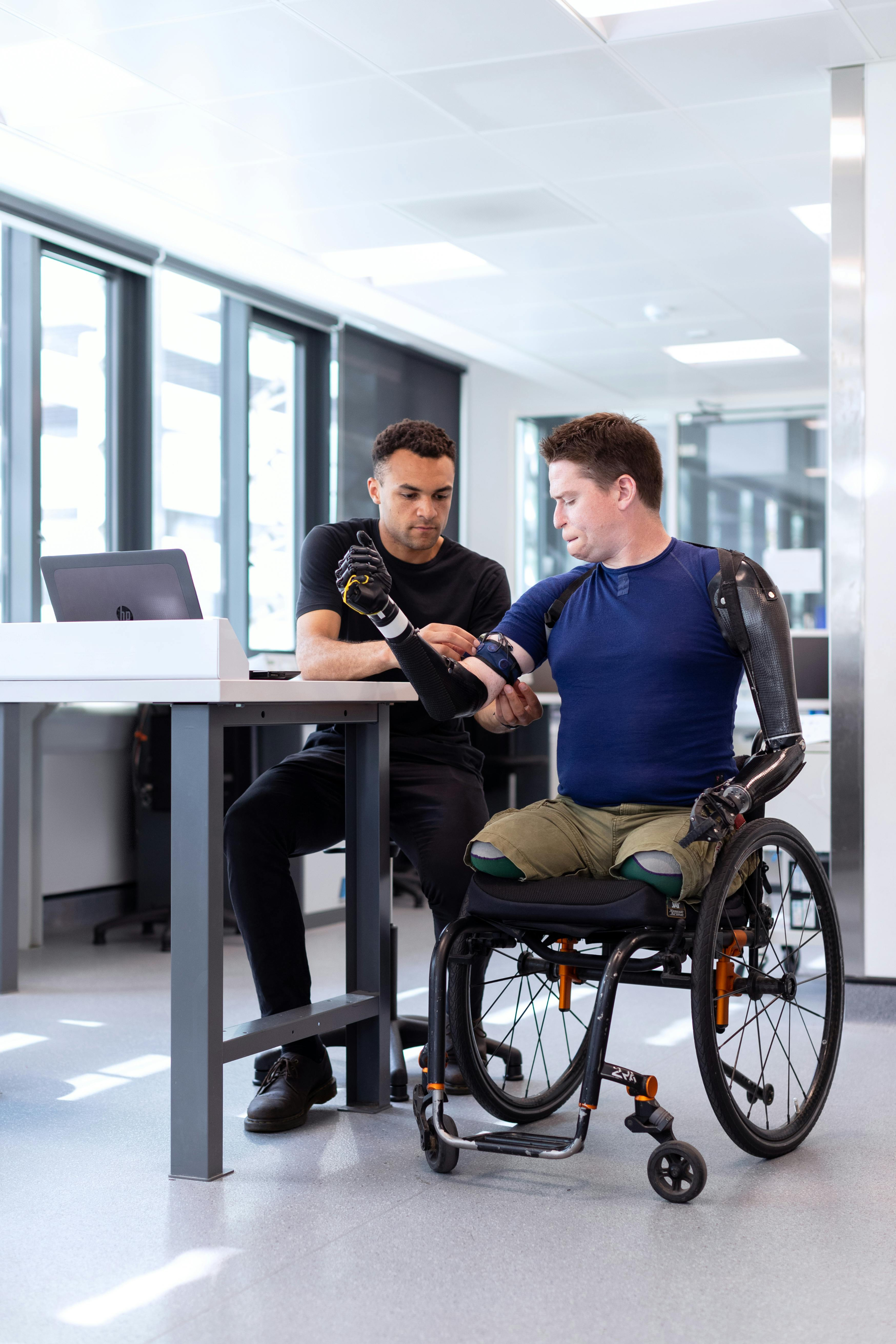 Person applying a medical device on a disabled person